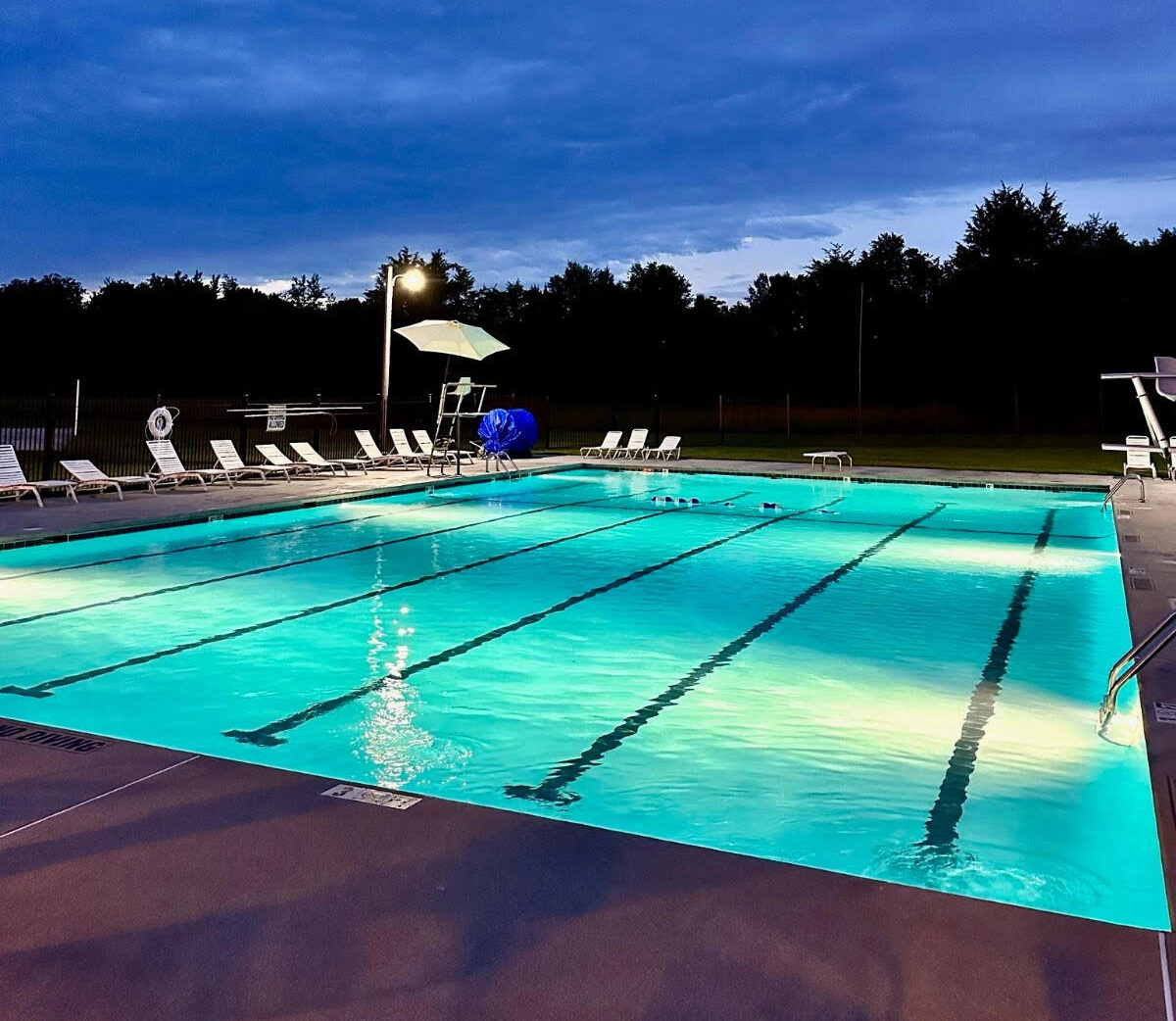 Sugarwood community swimming pool at dusk